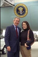 President George W. Bush met Katheryn Schindler upon arrival in New Orleans, Louisiana, on Tuesday, December 3, 2002. Schindler, a junior at Tulane University, volunteers as a mentor and tutor with the Community Action Council of Tulane University Students (CACTUS). 