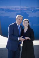 President George W. Bush presented the President’s Volunteer Service Award to Laura Chanan, 18, upon arrival at the airport in Santa Ana, California, on Monday, April 24, 2006.  Chanan, a senior at Tarbut V’Torah Community Day School, is a volunteer with Volunteer Center Orange County. To thank them for making a difference in the lives of others, President Bush has met with more than 490 individuals around the country, like Chanan, since March 2002.