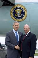 President George W. Bush met Charlie Graas upon arrival in Springfield, Missouri, on Friday, July 30, 2004.  Graas is an active volunteer with the Stone County Food Pantry and the United Way.