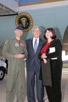 President George W. Bush presented the President’s Volunteer Service Award to Karen Stark upon arrival at Tinker Air Force Base, Oklahoma, on Friday, September 12, 2008.  Stark is the founder of The Hugs Project.  To thank them for making a difference in the lives of others, President Bush honors a local volunteer when he travels throughout the United States.  He has met with more than 650 volunteers, like Stark, since March 2002.