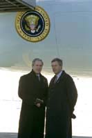 President George W. Bush met Jerry Nienhuis upon arrival in Grand Rapids, Michigan, on Wednesday, January 29, 2003. Nienhuis has volunteered as a mentor with Kids Hope USA for the past seven years.