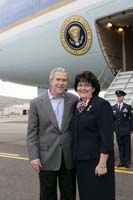 President George W. Bush presented the President’s Volunteer Service Award to Cathy McAdoo upon arrival at the airport in Elko, Nevada, on Thursday, November 2, 2006.  McAdoo is a volunteer with Calvary Baptist Church and a variety of community organizations including the National Guard Family Assistance Support Program.  To thank them for making a difference in the lives of others, President Bush honors a local volunteer, called a USA Freedom Corps Greeter, when he travels throughout the United States.  President Bush has met with more than 550 individuals around the country, like McAdoo, since March 2002.