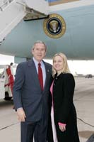 President George W. Bush presented the President’s Volunteer Service Award to Kathryn Ostapuk upon arrival in Miramar, California, on Tuesday, December 7, 2004.  Ostapuk, 24, is an active volunteer with MarineParents.com, a non-profit web site launched in 2003 to provide parents and loved ones of deployed Marines a central gathering place for information and support.