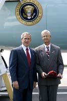 President George W. Bush met Tom Shaffer upon arrival in Ridley Park, Pennsylvania, on Tuesday, August 17, 2004.  Shaffer is an active volunteer with Race Against Drugs, a national drug awareness and prevention program for youth. 