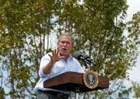 On April 23, 2004, President Bush spoke about his volunteer service initiative at a coastal reserve outside of Naples, Fla. Prior to the speech, the President served with 10 members of AmeriCorps*NCCC removing invasive plants from the reserve.