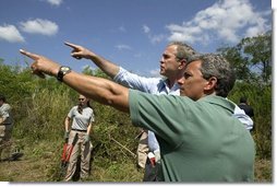 President George W. Bush tours Rookery Bay National Estuarine Research Reserve with its director Gary Lytton in Naples, Fla., Friday, April 22, 2004. "Of all the coastal wetlands in the lower 48 states, 20 percent are right here in Florida. This is a legacy we need to protect and pass along," said the President in his remarks.   White House photo by Eric Draper