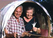 Shuler and her husband riding in a bullock cart while serving in India