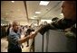 President George W. Bush thanks emergency personnel inside the FEMA Joint Field Office in Baton Rouge, Louisiana, Sunday, Sept. 25, 2005. White House photo by Eric Draper