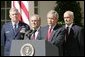 President George W. Bush speaks to the nation during a weekly radio address, live from the Rose Garden at the White House in Washington, D.C., September 3, 2005. Accompanying the president are (L to R) Chairman of the Joint Chiefs of Staff, General Richard Myers, Secretary of Defense Donald Rumsfeld and Homeland Secretary Michael Chertoff. White House photo by Paul Morse