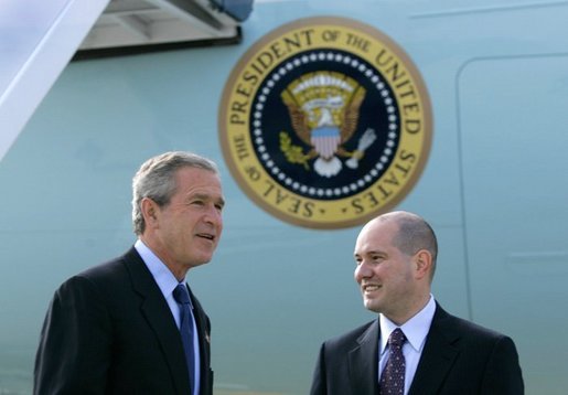 President George W. Bush meets with Freedom Corps Greeter Eric Rasmussen at Detroit Metropolitan Wayne County Airport, Friday, July 23, 2004. Rasmussen, a volunteer with the Tax Assistance Program at the Volunteer Accounting Service Team of Michigan, is the 300th USA Freedom Corps Greeter, since the President began greeting outstanding volunteers in communities across America in March 2002. White House photo by Eric Draper