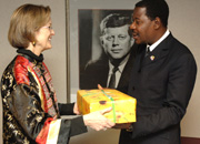 President Yayi presents a gift of appreciation to Deputy Director Olsen.