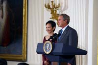 President George W. Bush presented the President’s Volunteer Service Award to Kathleen Nguyen in a ceremony in the East Room of the White House on May 26, 2005. The ceremony, part of a White House celebration of Asian Pacific American Heritage Month, was also attended by President Yudhoyono of Indonesia.