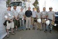 President Bush posed with a group of Habitat for Humanity AmeriCorps members in New Orleans on October 11 before heading to nearby Covington, La., to participate with them in a build for families left homeless by hurricane Katrina.
