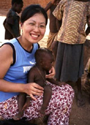 Lin and a young child in Burkina Faso