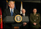 President George W. Bush is joined at the Pentagon Thursday, Nov. 29, 2007, by Secretary of Defense Robert Gates and Gen. James Cartwright, Vice Chairman of the Joint Chiefs of Staff, as he delivers a statement after briefings at the Department of Defense.  White House photo by Chris Greenberg