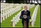 President George W. Bush gives a Memorial Day at the Normandy American Cemetery at Normandy Beach in France on May 27, 2002.  