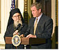 President Bush speaks with leaders of the Greek community in the White House.