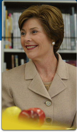 Photo of Mrs. Bush in school library