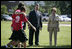  Mrs. Laura Bush and Mike Gottfried, CEO of Team Focus, watch Team Focus participants run a relay race Thursday, June 21, 2007, in Mobile, Ala., during a visit to Team Focus’ National Leadership Camp, as part of Helping America’s Youth initiative. Team Focus is a faith-based, nonprofit organization devoted to improving the lives of young men, ages 10-18, without fathers in their lives. 