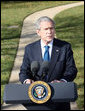 President George W. Bush delivers his remarks on the economy from the south driveway Friday, Dec. 5, 2008, at the White House. President Bush stated during his remarks, "We're working with the Federal Reserve and FDIC, and credit is beginning to move. A market that was frozen is thawing. There's still more work to do. But there are some encouraging signs." White House photo by Chris Greenberg