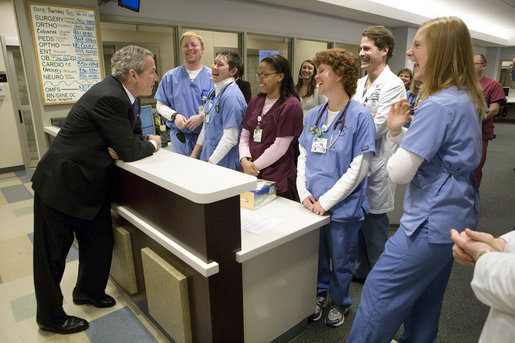 President George W. Bush visits with medical staff on his tour at the Saint Luke’s-Lee’s Summit hospital in Lee’s Summit, Mo., Thursday, Jan 25, 2007. President Bush later participated in a roundtable discussion on health care initiatives. White House photo by Eric Draper