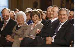 President George W. Bush and Mrs. Laura Bush are joined by his parents, former President George H. W. Bush and Mrs. Barbara Bush, during a reception in the East Room at the White House Wednesday, Jan. 7, 2008, in honor of the Points of Light Institute. President Bush's brother Neil is seen at far-left.  White House photo by Eric Draper