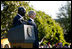 President George W. Bush stands with President John Agyekum Kufuor of Ghana Monday, Sept. 15, 2008, during a South Lawn Arrival Ceremony for the African leader at the White House.