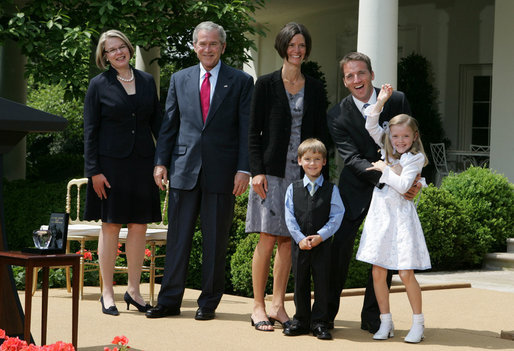 President George W. Bush and Secretary of Education Margaret Spellings join Mike Geisen, the 2008 National Teacher of the Year, and his family as they celebrate the 7th grade teacher's honors Wednesday, April 30, 2008, in the Rose Garden of the White House. Family members include Mr. Geisen's wife, Jennifer, and their children, Johanna, 8, and Aspen, 6. White House photo by Joyce N. Boghosian