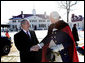 President George W. Bush shakes hands with General George Washington, played by actor Dean Malissa, following President Bush’s address at the Mount Vernon Estate, Monday, Feb. 19, 2007 in Mount Vernon, Va., honoring Washington’s 275th birthday. White House photo by Eric Draper