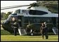 President George W. Bush and Laura Bush depart the South Lawn en route to Andrews Air Force Base, Friday, Sept. 10, 2004.  White House photo by Joyce Naltchayan