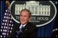 President George W. Bush smiles as he listens to reporter's question Thursday, Jan. 26, 2006, during a press conference at the White House that covered several topics including economy, the upcoming election year and fiscal policy.  White House photo by Kimberlee Hewitt