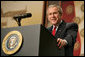 President George W. Bush addresses the American Legion on the global war on terror, Friday, Feb. 24, 2006 at the Capital Hilton Hotel in Washington. President Bush voiced his support for free elections in the Middle East, saying that free elections are instruments of change, giving people an opportunity to organize, express views and change their existing order, strengthening the forces of freedom and allowing citizens to take control of their own destiny.  White House photo by Kimberlee Hewitt