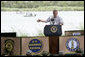 President George W. Bush delivers his remarks on immigration reform from a stage along the Rio Grande River on the U.S.-Mexico border Thursday, Aug. 3, 2006, at the Anzalduas County Park and Dam in Mission, Texas.  White House photo by Eric Draper