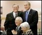 President George W. Bush and Senator Pete Domenici, R-NM., visit with breakfast guests at Bear Canyon Senior Center, Tuesday, March 22, 2005, in Albuquerque. The two visited with more than 30 seniors who were on hand to hear the president’s proposals for Social Security reform.  White House photo by Eric Draper