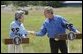 President George W. Bush and Japanese Prime Minister Junichiro Koizumi shake hands before beginning a news conference at the President's ranch near Crawford, Texas, Friday morning, May 23, 2003.  White House photo by Eric Draper