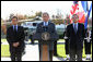 President George W. Bush is joined by French President Nicolas Sarkozy, left, and Jose Manuel Barroso, President of the European Commission as he addresses the media during a meeting at Camp David concerning the economic crisis and the need for coordinated global response Saturday, October 18, 2008.  White House photo by Chris Greenberg