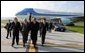 Arriving in Harrisburg, Pa., President George W. Bush walks with Pennsylvania Attorney General Mike Fisher, far left, Rep. George Gekas, center, and Governor Mark Schweiker Friday, Nov. 1.  White House photo by Paul Morse