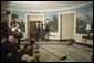 President George W. Bush, with Mrs. Laura Bush by his side, comments on the formation of the new govenment in Iraq, Sunday, May 21, 2006 in the Diplomatic Reception Room of The White House.  White House photo by Kimberlee Hewitt