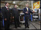 President George W. Bush delivers a statement to the media following his tour of the production floor at the Silverado Cable Company in Mesa, Arizona, Tuesday, May 27, 2008. Also pictured are Bob Simpson Jr. President of Silverado Cable Company and Mitch Simpson, Vice President of Silverado Cable Company. White House photo by Eric Draper