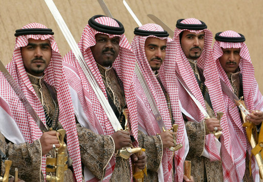 Sword dancers pose for a photograph Tuesday, Jan. 15, 2008, as they await the arrival of President George W. Bush to Al Murabba Palace in Riyadh. The President spent his last day in Saudi Arabia participating in a roundtable, visiting the King's Palace and National History Museum, and spending the evening at Al Janadriyah, the King's ranch. White House photo by Eric Draper