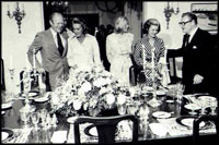 Then-Vice President Nelson Rockefeller (right) and his wife Margaretta Murphy (second on right) entertain then-President Gerald R. Ford (left) his wife Betty (second on left) and their daughter Susan (center) at the Naval Observatory on September 7, 1975.