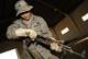 Airman leads team in managing enemy's weapons cache