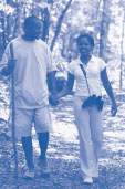 Image of a couple are trail walking.