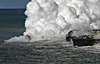 Lava bubble bursts in shallow water in front of East Lae`apuki bench