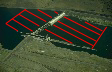 Aerial photo with line overlay marking out areas around The Dalles Dam that are part of the Boat Restricted Zone (BRZ).