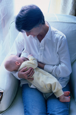 photo of woman breastfeeding