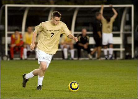 Mike Chere gets ready to play the ball forward