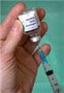 vaccine vial with syringe