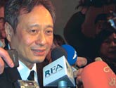 Academy Award winning film director Ang Lee speaks with Radio Free Asia and other news outlets after the Oscars ceremony in Los Angeles.