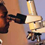 Photo: A researcher looking into a microscope.